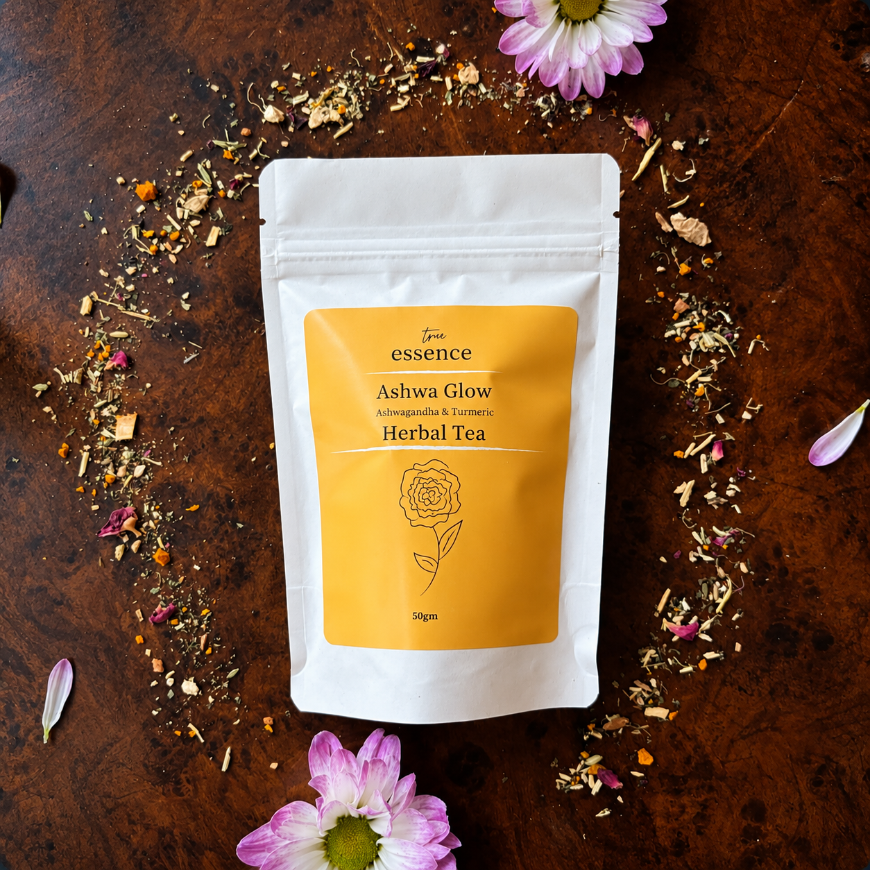 Package of Ashwa Glow herbal tea blend on warm wooden surface